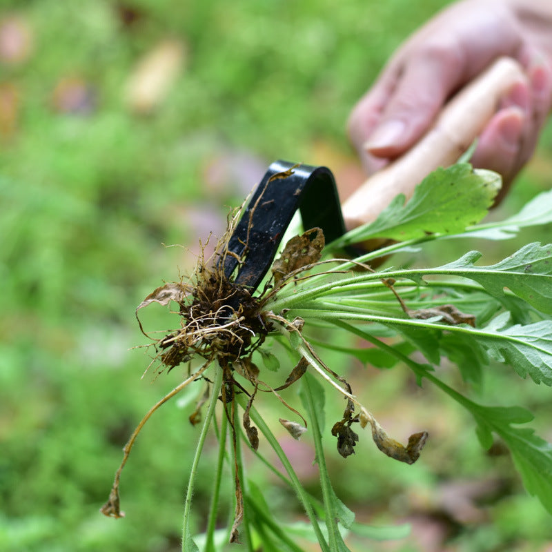 Praktiskt trädgårdsverktyg för ogräsrensning och plantering av plantor